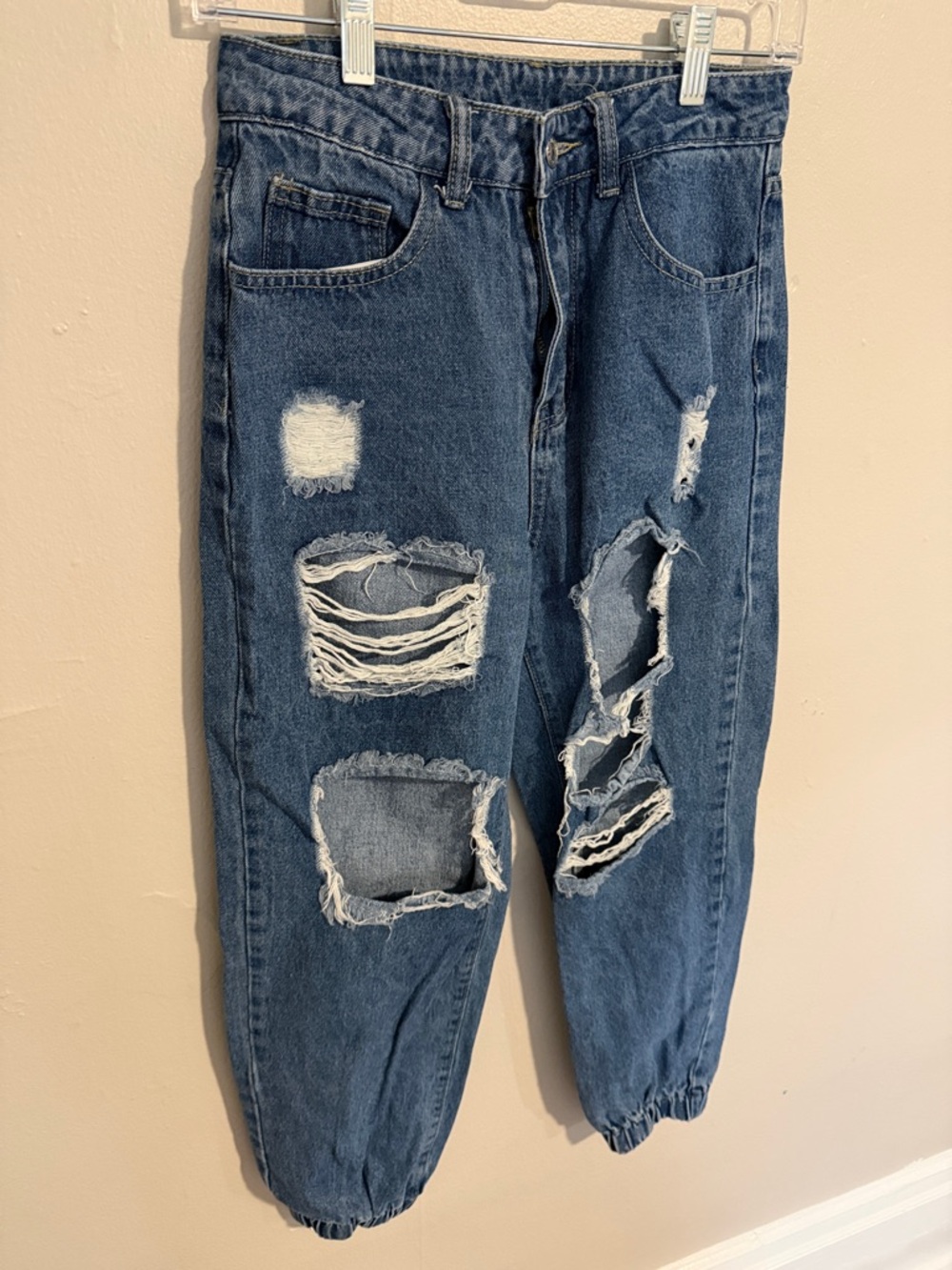 Distressed Blue Denim Jeans
